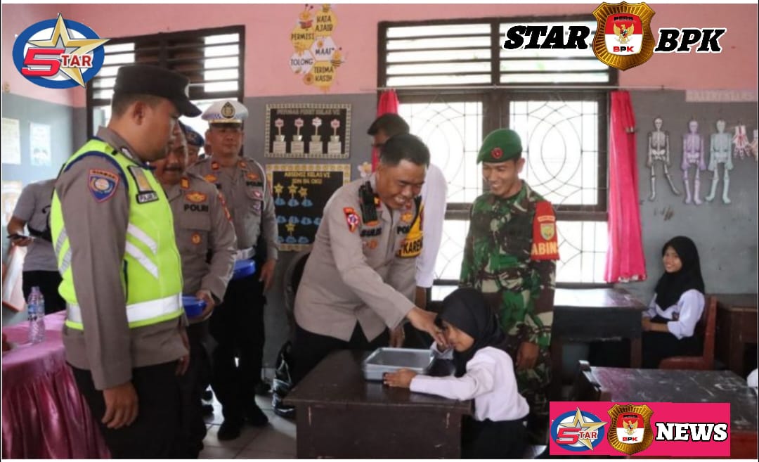 Kegiatan Pemberian Makan Bergizi Gratis (MBG) oleh Polres OKU untuk Siswa SD Negeri 54 OKU